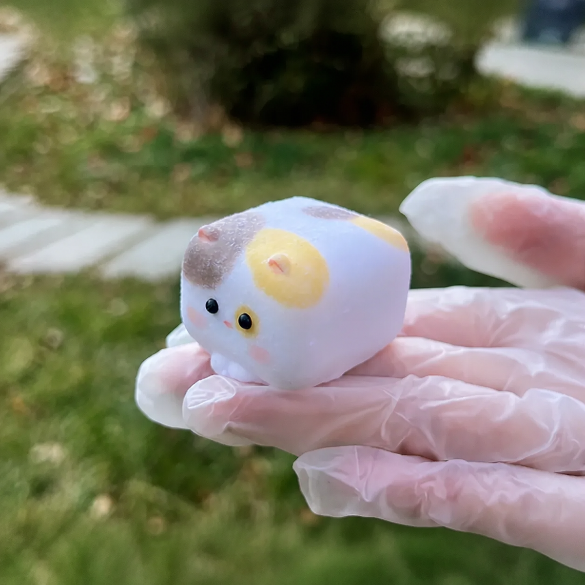 Calico Cube Cat slow-rise silicone squishy close-up